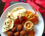 A picture of step 6 of Pita bread with falafel hummus sandwich.