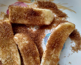 A picture of step 4 of Caramalized banana split sundae.
