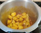 A picture of step 4 of LASANIYA BATATA nu SHAAK...