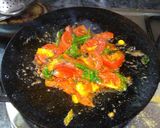 A picture of step 3 of Tawa fry tomato.