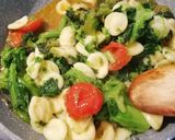 Foto del passaggio 7 della ricetta Orecchiette con cime di rape alla barese
