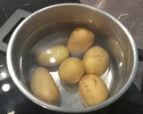Foto del paso 4 de la receta: Costilla de cerdo al horno con guarnición de patatas