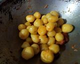 A picture of step 1 of Koraishutir Kochuri R Aaloor Dum.