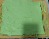A picture of step 10 of Kiwi swiss roll cake.