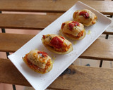 Foto del paso 6 de la receta: Patatas rellenas de boloñesa gratinadas