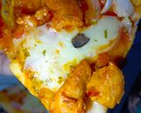 A picture of step 12 of Chicken spicy pizza.