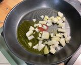 Une image de l'étape 3 de Pois chiches aux champignons et poulet épicé.