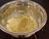 A picture of step 5 of White Peppermint Layer Cake with a White Peppermint Cream.