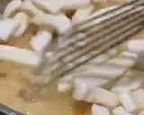 A picture of step 7 of Fregola sarda with prawns, squid, scallops, blue eye cod and light tomato sauce.