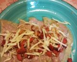 Foto del paso 5 de la receta: Enfrijoladas con chorizo y cebolla