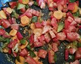 Foto del paso 4 de la receta Cazuela vegetariana de garbanzos con tomate y huevos poché