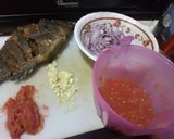 A picture of step 2 of Fried fish,ugali with greens(kunde,managu,terere and spinach).