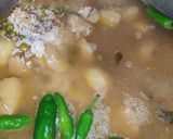 A picture of step 6 of Aloo and Matar pulao.
