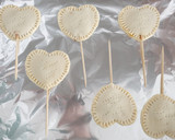 Foto del paso 8 de la receta: Piruletas corazón de hojaldre relleno de mermelada