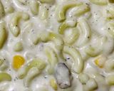 A picture of step 8 of Signature s’ creamy sauce macroni/pasta.