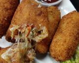 A picture of step 11 of Chicken,Aalu, cheez,roll.
