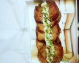 A picture of step 4 of Malpura with rabri.