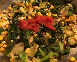 A picture of step 2 of Sautéed Collard Greens, Brussel Sprouts and Corn.