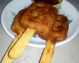 A picture of step 6 of Patato chicken sticks.
