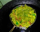 A picture of step 3 of Roasted dry fruits n caremalized fruits in Maggie basket.