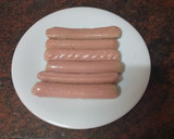 Foto del paso 3 de la receta: Pasta al ajillo con huevo frito y salchichas