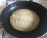 A picture of step 7 of Huevos Rancheros w/tortilla.