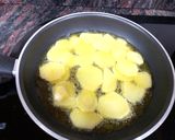 Foto del paso 2 de la receta: Revuelto de champiñones y espárragos con patata