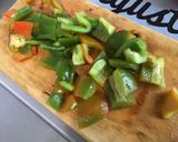 A picture of step 10 of Beef with Peanuts, Peppers, and Ginger.
