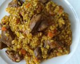Foto del paso 6 de la receta: Arroz meloso con higaditos de pollo