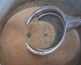 A picture of step 3 of Cardamom chai.