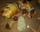 Foto del paso 5 de la receta: Papa rellenas con niño envuelto y salsa blanca