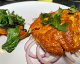A picture of step 8 of Tandoori Cod with Wilted Spinach.