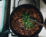 A picture of step 14 of Gizzard with rice and greens.