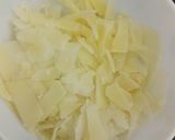 A picture of step 2 of Baby Corn fingers with cheesy dip.
