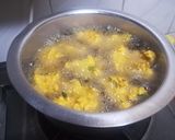 A picture of step 4 of Spicey coated potatoes.