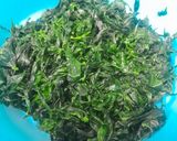 Foto langkah ke 1 dari resep Oseng Daun Pepaya Jepang Pindang Tongkol.