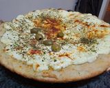 Foto del paso 11 de la receta: A la masa con los niños de la casa, pizza casera para hacer en familia