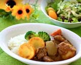 A picture of step 11 of Quick and Easy Pressure Cooker Curry Rice.