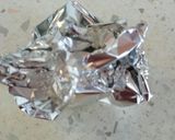 A picture of step 2 of Roasted garlic bulb.