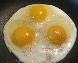 A picture of step 2 of Eggs over Collards.