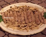 A picture of step 8 of Savory Pork Rolls with Two Kinds of Mushrooms.