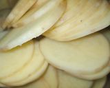 A picture of step 1 of Potato Onion Fry.