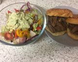 A picture of step 6 of Garlic Fried Lamb and an Advacado garlic sauce salad.