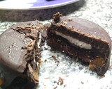 Foto del paso 3 de la receta: Bomboncitos rellenos de dulce de leche y oreo 💗