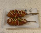 A picture of step 6 of Japanese corn dogs.