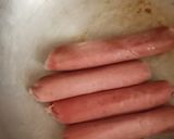 A picture of step 2 of Sumptuos Fried Beef Sausages using very little oil.