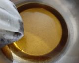 A picture of step 7 of Homemade Ghee/ clarified butter.