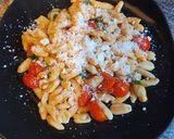A picture of step 6 of Cavatelli with tomato and rocket.