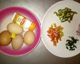 A picture of step 1 of Veggies omelette with fried potatoes.