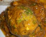 A picture of step 7 of Omena balls in coconut sauce.